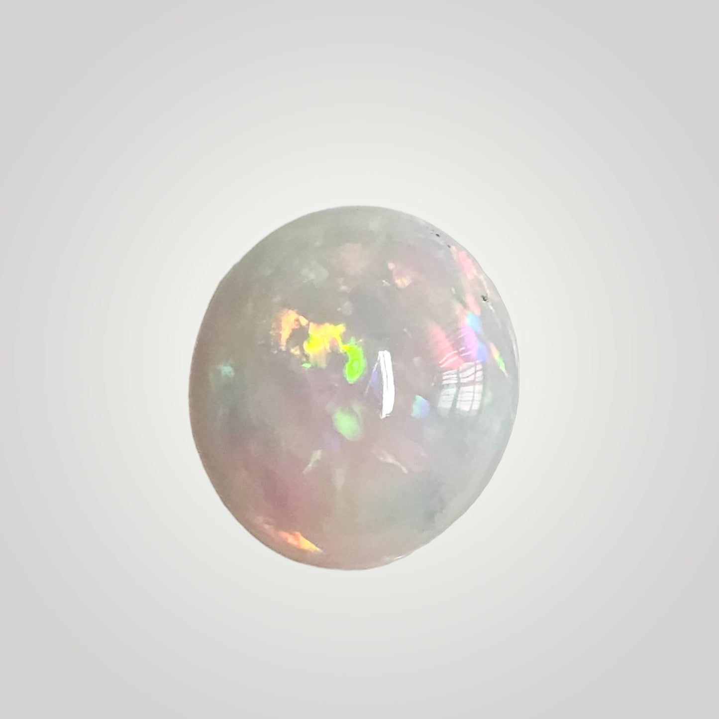 Certified Ethiopian Opal 10.59 Cts (11.64 Ratti) LXDG10
