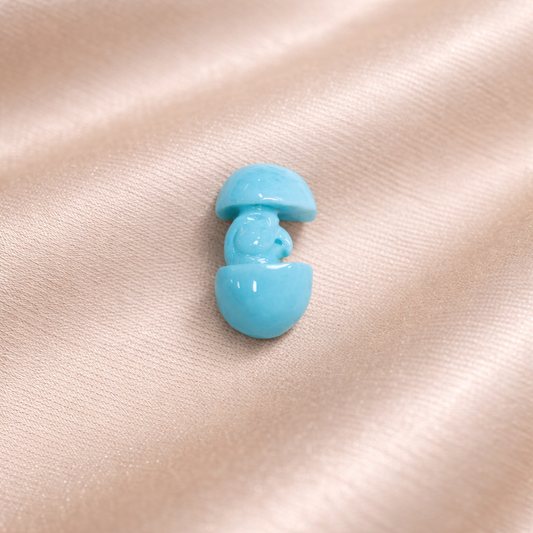 Larimar Parrot Carvings, sized at 19.71 × 11