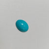 Turquoise stone on a light gray background