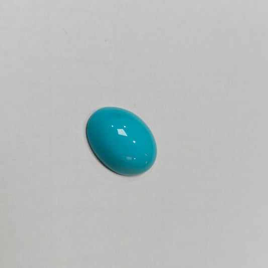 Turquoise stone on a light gray background