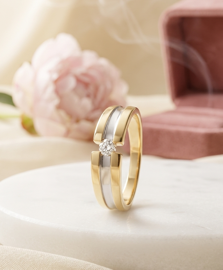 Gold ring with a diamond on a soft fabric background